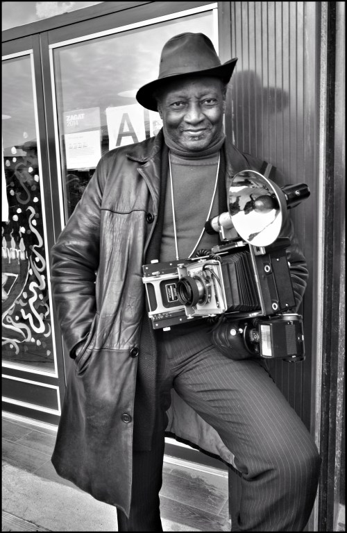The seminal NY Street Photographer Louis Mendez covering the event.